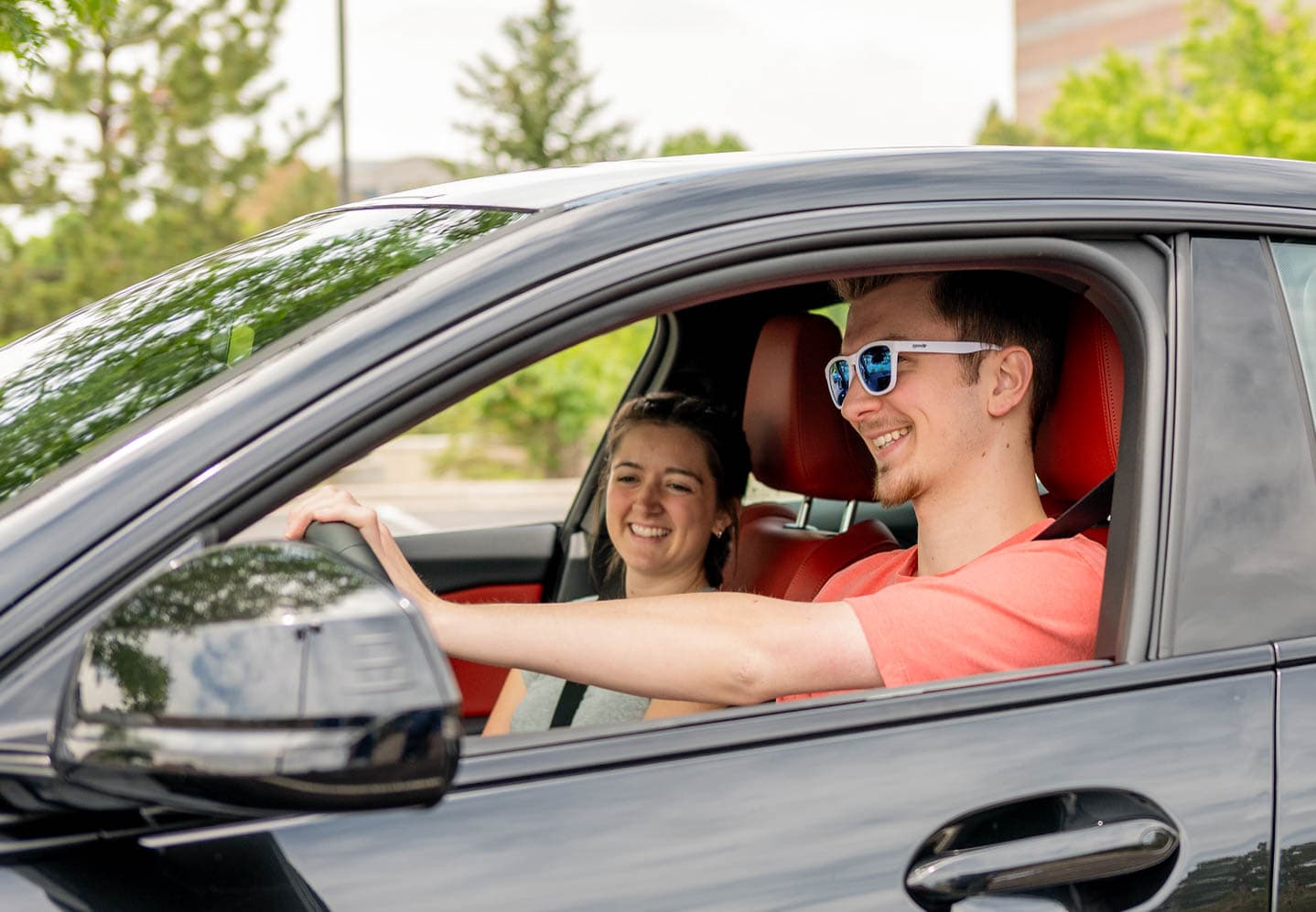 Happy teens in car